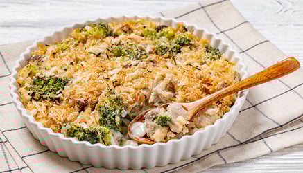 chicken and broccoli casserole served on a table in a dish